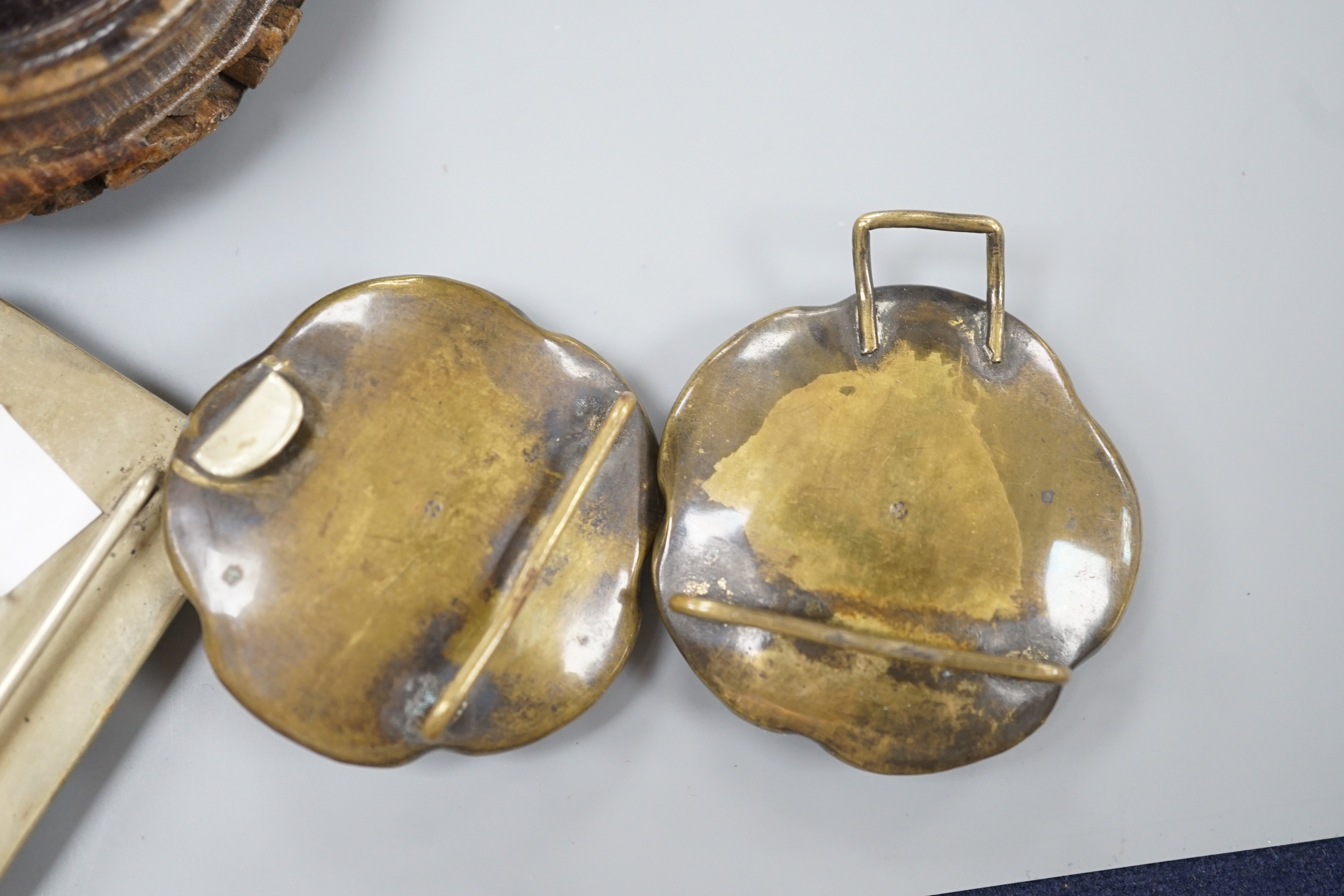 A group of Japanese small or miniature Kutani and Imari vessels and three Satsuma pottery mounted brooches, largest 11.7cm